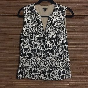 Ann Taylor peplum top, animal print, size zip.
